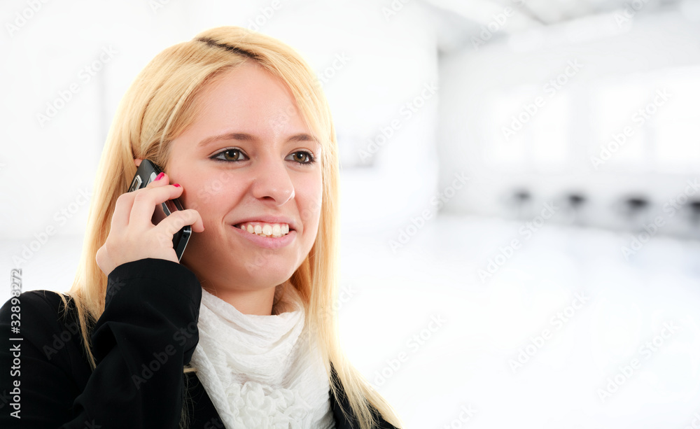 Businesswoman talking at the phone Businesswoman talking at the phone