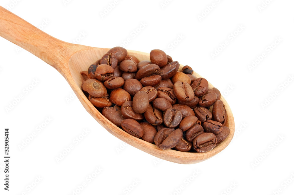 Fototapeta premium Coffee beans in wooden spoon, isolated on a white background