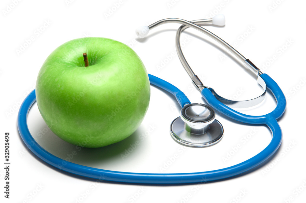 Green apple with stethoscope Green apple with stethoscope