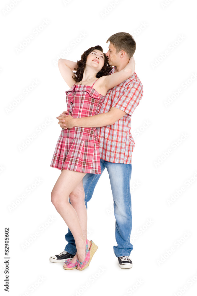 Guy hugs the girl behind. Guy hugs the girl behind.