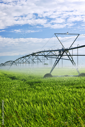 Fotografie Irrigation equipment on farm field