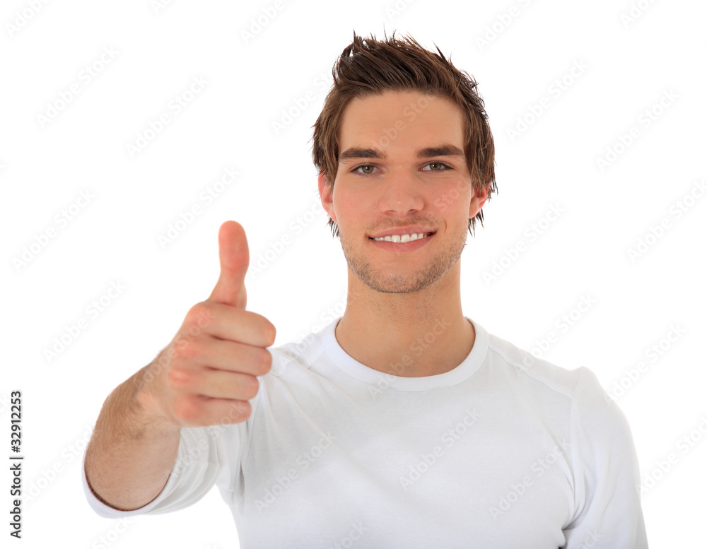 Junger Mann zeigt Daumen hoch Stock Photo | Adobe Stock