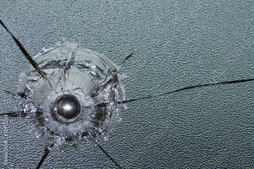Glass broken bullet steel © olegusk