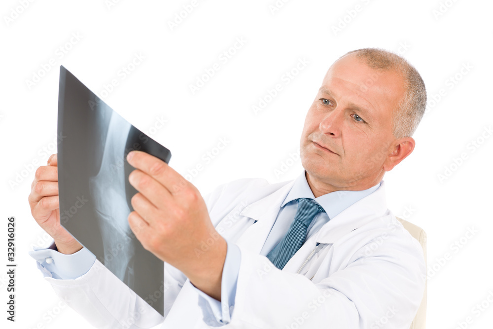 Mature senior doctor male hold x-ray sitting Mature senior doctor male hold x-ray sitting
