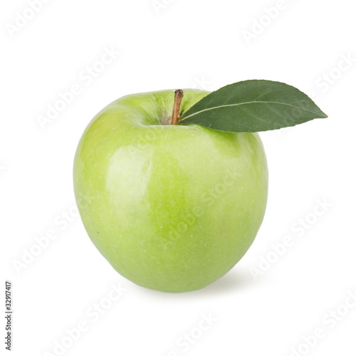 Ripe green apple with a leaf on a white background