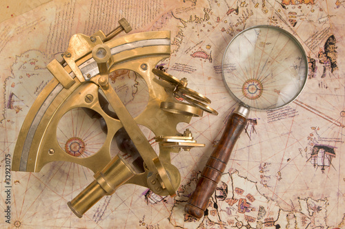 Sextant on old map photo