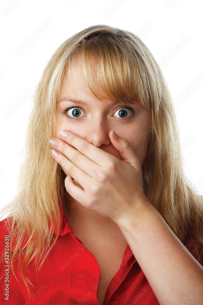 Portrait of scared woman covering mouth with hand Portrait of scared woman covering mouth with hand