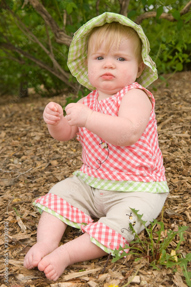Little Girl Playing With Dandelion