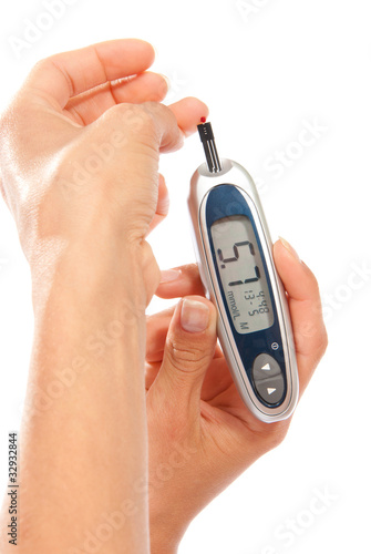 Diabetes patient measuring glucose level blood test