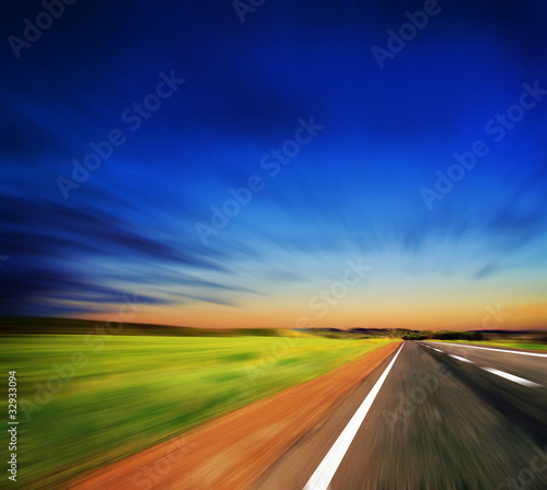 blured road and blue sky © grthirteen