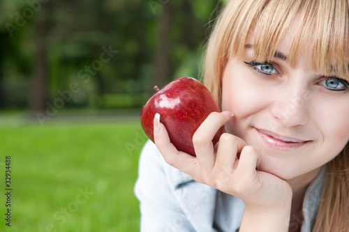 beautiful girl with an apple