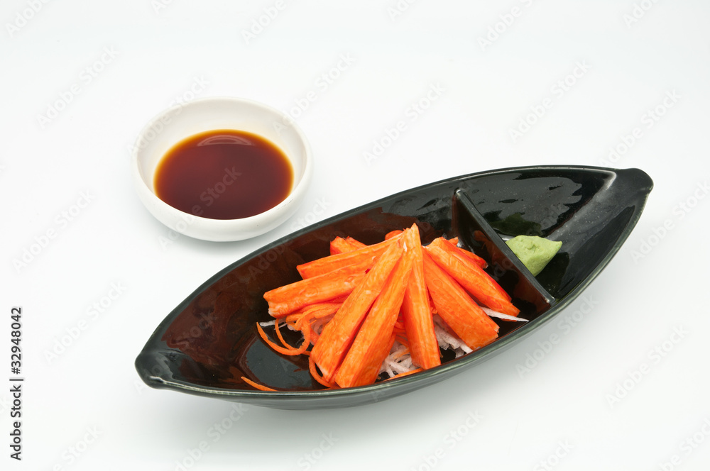 imitation crabmeat and wasabi on white background imitation crabmeat and wasabi on white background