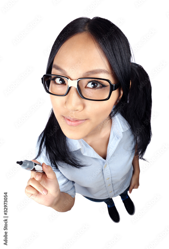 Wide Angle shot of a student holding a marker Wide Angle shot of a student holding a marker