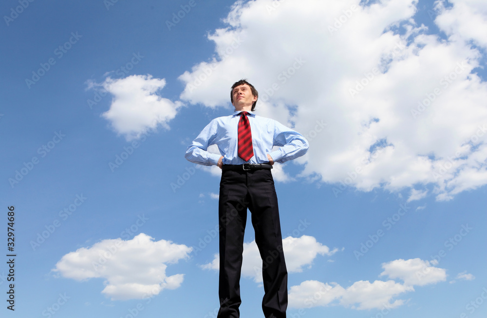 young business man in a blue shirt and red tie young business man in a blue shirt and red tie