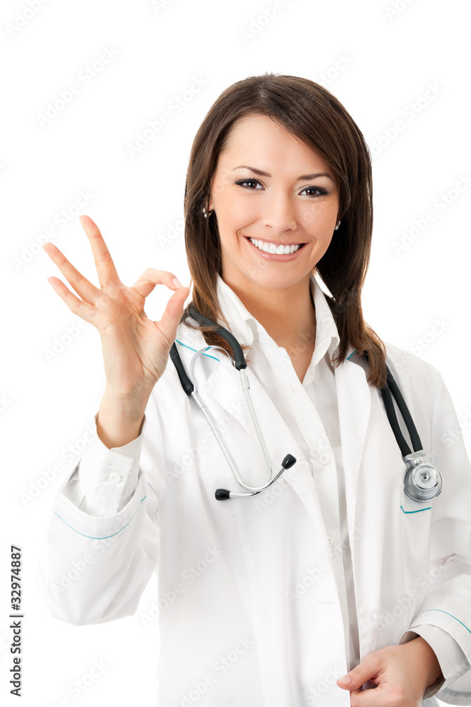 Happy smiling female doctor with okay gesture, isolated Happy smiling female doctor with okay gesture, isolated