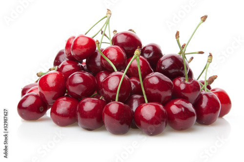 Fresh cherries isolated on white.