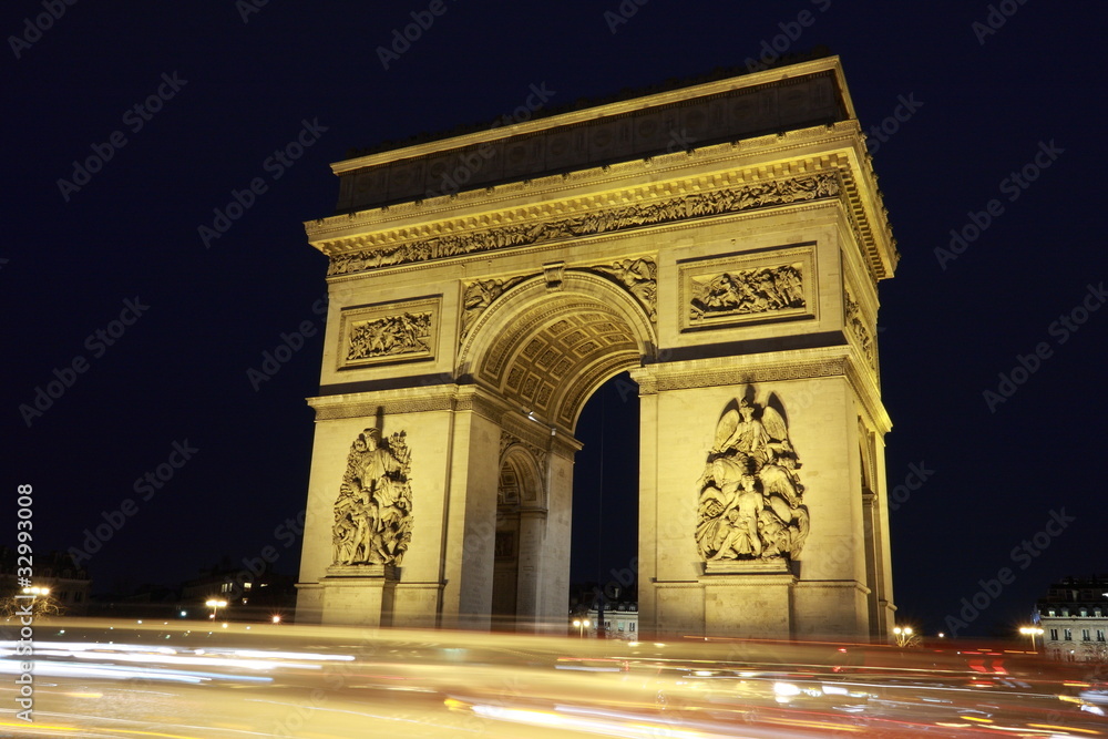 Arc in Paris Arc de triumph, night view with car lights trail