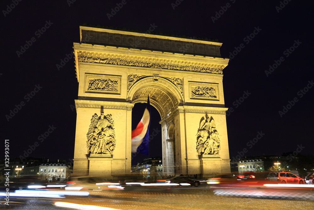 Arc in Paris Arc de triumph, night view with car lights trail