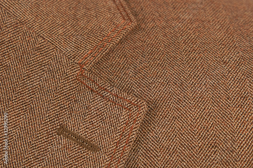 brown elegant buttonhole suit