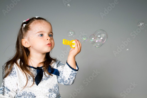 little girl with bubbles