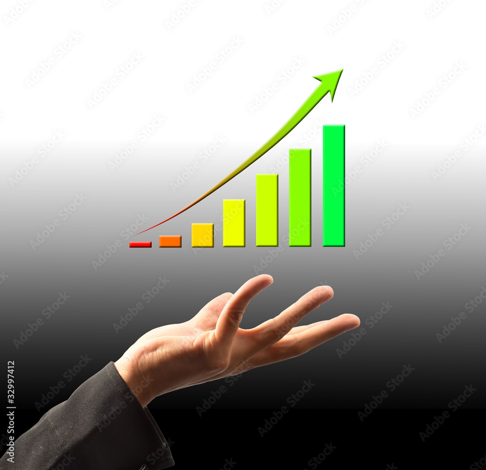 Businessman holding growing graph Businessman holding growing graph