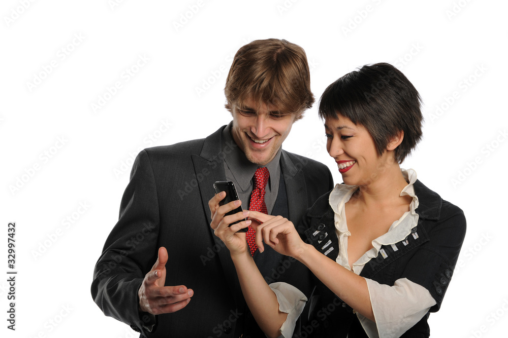 Couple looking at a  cell phone and smiling