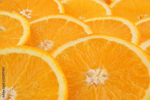 Fresh juicy orange slices background