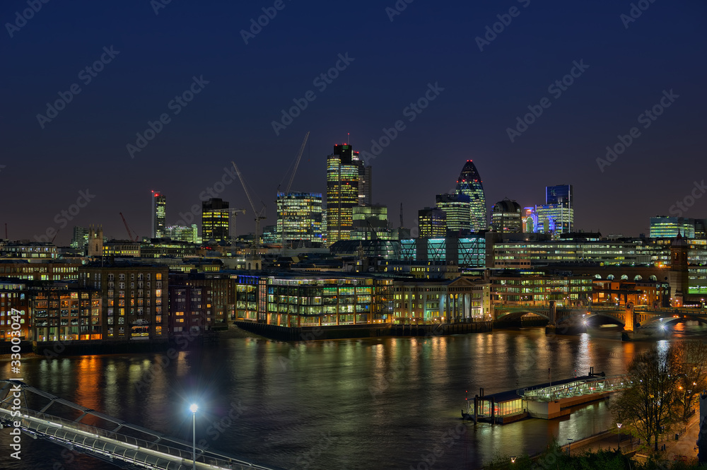 City of London, England, UK, over River Thames, at nightfall