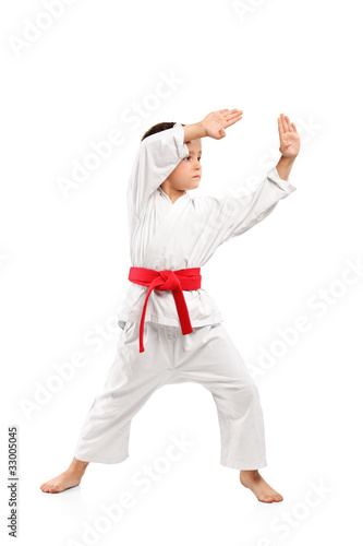 Karate boy exercising