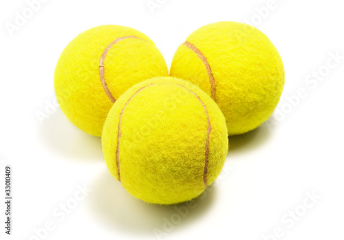Tennis balls on white background photo
