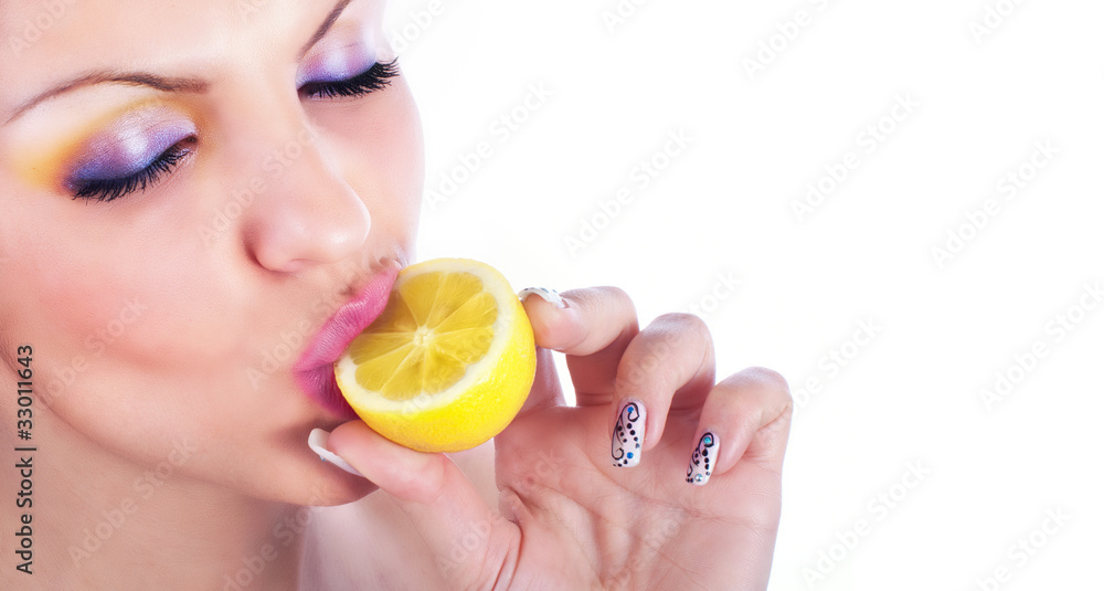 Close up photo of a women with lemon Close up photo of a women with lemon
