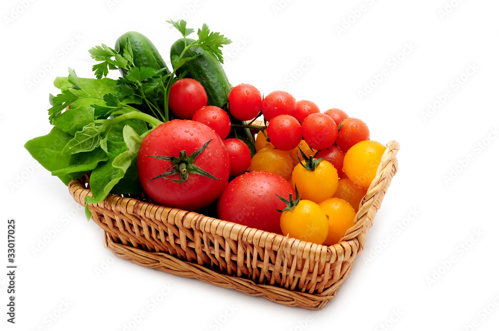 vegetables and wicker basket isolated on white vegetables and wicker basket isolated on white