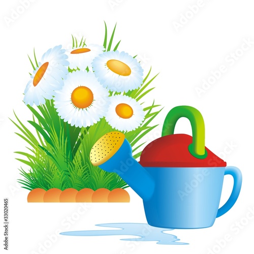 watering can and flower bed
