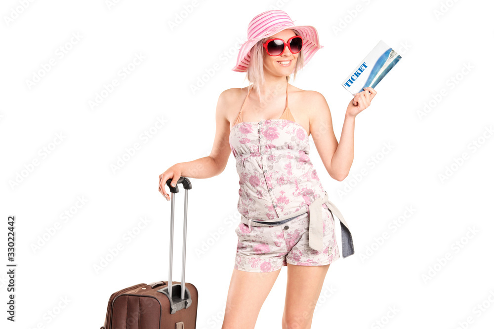 Portrait of a tourist girl holding a ticket and luggage Portrait of a tourist girl holding a ticket and luggage