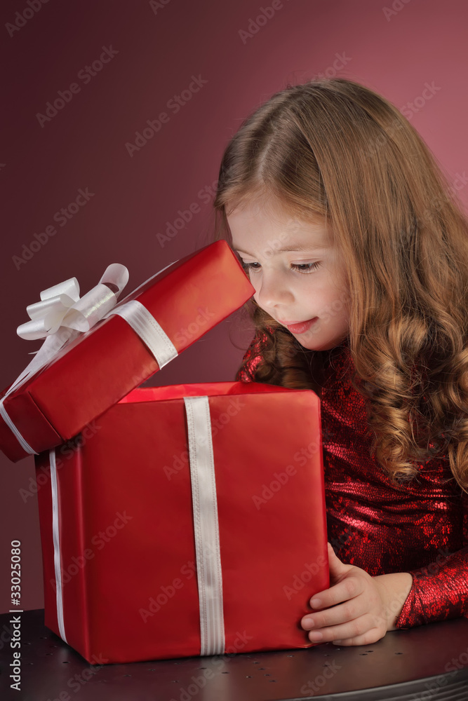 litle girl open red gift box litle girl open red gift box