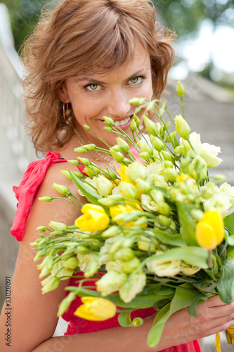 Young woman with beautiful bouquet
