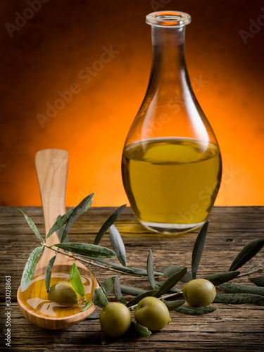 olive oil over wood spoon