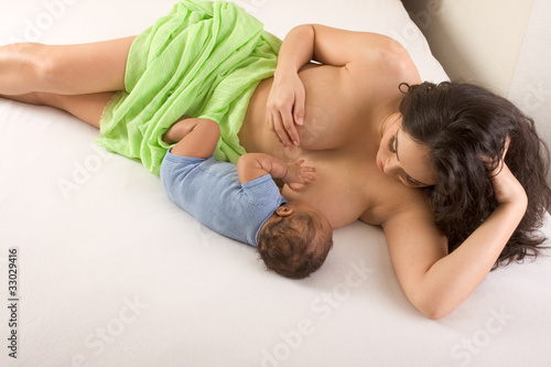 Ethnic Hispanic Mother breastfeeding her son