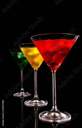 Martini drinks on black background