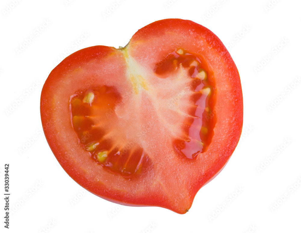 Half of tomato isolated on a white background Half of tomato isolated on a white background