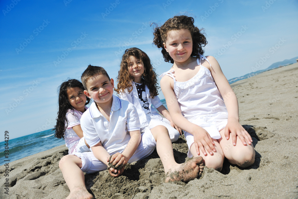 happy child group playing on beach happy child group playing on beach