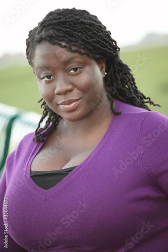 Young black woman with cleavage © Felix Mizioznikov