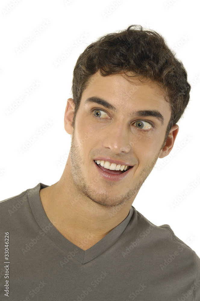 Fototapeta premium Closeup of a handsome young teenaged guy looking away in thought