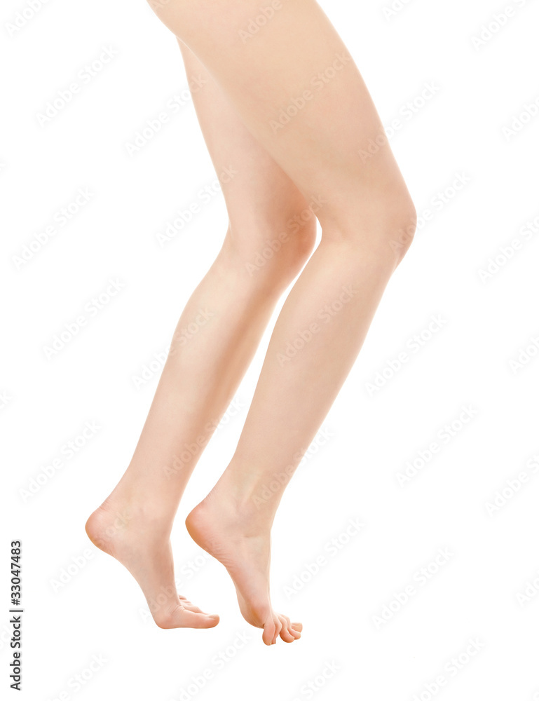 Long pretty woman legs isolated on white background