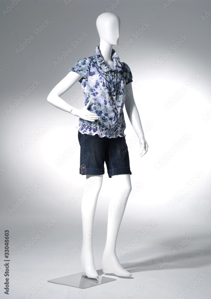 full-length collection of dress on mannequin in light background full-length collection of dress on mannequin in light background