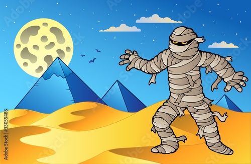 Night scene with mummy and pyramids