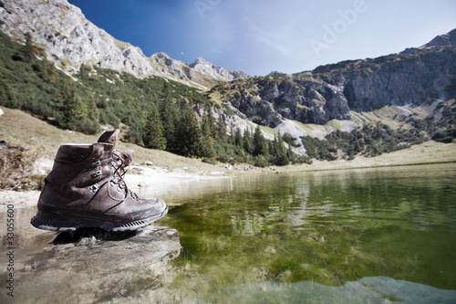 Hiking Boots on Gaisalpsee in the Alps photo