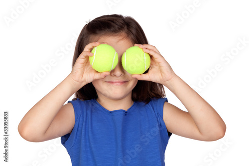 Brunette little girl with two tennis balls © Gelpi