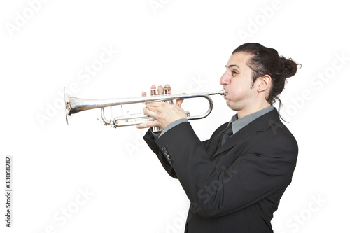Photography stylish jazz man playing the trumpet on white background