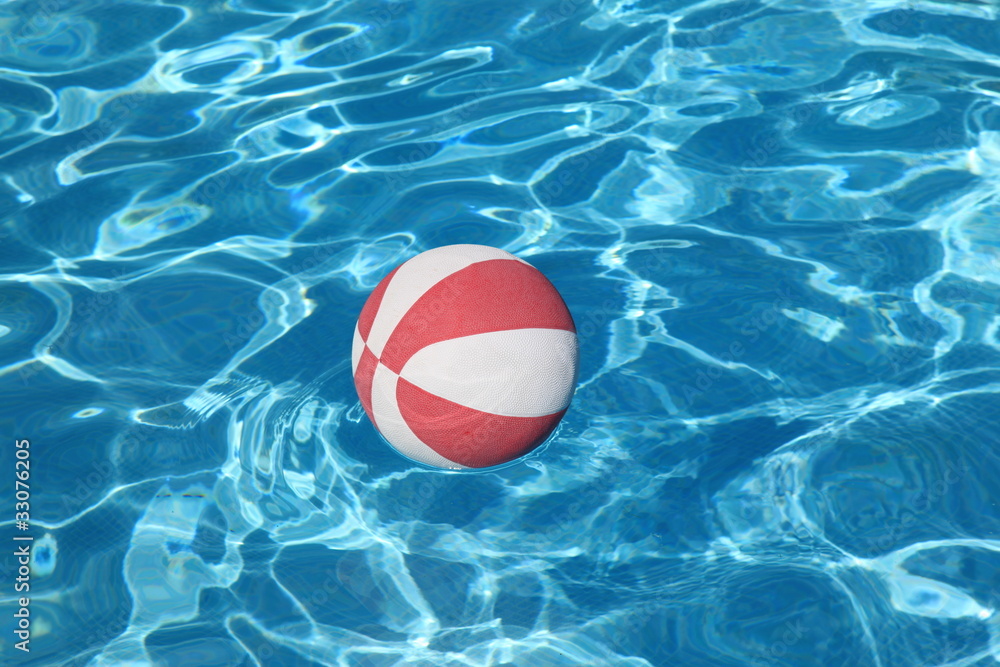 Beach Ball In Swimming Pool